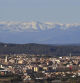 Palafrugell y los Pirineos nevados visto desde el Far de Sant Sebastià.