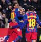 Barcelona's Ronald Araujo celebrates with Lamine Yamal his side's second goal during a Copa del Rey quarterfinal soccer match between Albacete and Barcelona, in Albacete, Spain, Tuesday, Feb. 3, 2026. (AP Photo/Manu Fernandez)