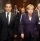 El presidente francés, Nicolas Sarkozy, y la canciller alemana, Angela Merkel, durante una de las reuniones antes de la cumbre de líderes de la Eurozona en Bruselas