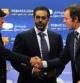 Sandro Rosell, presidente del F.C. Barcelona saluda al vicepresidente de la Qatar Fundation Ahmad al Sulaiti, durante la firma del acuerdo de patrocinio