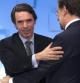 Rajoy y Aznar, se abrazan al inicio de la Convención nacional del PP que se está celebrado en Sevilla