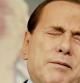 Berlusconi gesticula durante la rueda de prensa de esta mañana en Roma