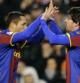 Adriano y Messi celebran el gol del argentino ante el Valencia