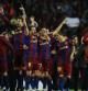 Los juadores del Barça celebran la victoria sobre el césped del Camp Nou
