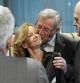 El presidente del Eurogrupo y primer ministro de Luxemburgo, Jean-Claude Juncker, saluda con un beso a Elena Salgado