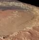 Foto facilitada por la Agencia Espacila Europea (ESA), que presentan un cráter en las tierras altas del sur de Marte que fue el lecho de un gran lago cuando el agua fluía por la superficie de ese planeta