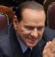Silvio Berlusconi atiende durante una votación parlamentaria en la Cámara de los Diputados en Roma.