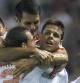 Los jugadores del Sevilla FC celebran el primer gol de su equipo, materializado por el centrocampista Manu del Moral, frente al Sporting de Gijón
