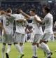 Los jugadores del Real Madrid celebran el gol de Benzema