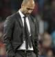 El entrenador del FC Barcelona, Pep Guardiola, con expresión seria durante el partido frente al Sevilla FC correspondiente a la novena jornada de la Liga de Primera División disputado en el estadio Camp Nou, en Barcelona