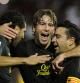 Los jugadores del Barça celebran el gol de Xavi ante el Granada