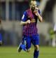El centrocampista del F. C. Barcelona, Andres Iniesta (d), celebra el gol del equipo blaugrana, durante el encuentro correspondiente a la ida de los dieciseisavos de la Copa del Rey, que les enfrenta esta noche al L`Hospitalet, en el estadio de la Feixa Llarga de Hospitalet