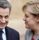 El presidente francés Nicolás Sarkozy junto a la canciller alemana Angela Merkel durante la cumbre de Estrasburgo, en la que se han reunido con el nuevo primer ministro italiano Mario Monti