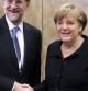 Imagen de Mariano Rajoy saludando a la canciller alemana, Angela Merkel, en Marsella.