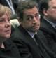 El presidente francés Nicolás Sarkozy junto a la canciller alemana Angela Merkel y el presidente de la Comisión Europea José Durao Barroso durante el encuentro de Marsella