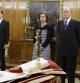 Luis deGuindos jura su cargo como ministro dede Economía y Competitividad ante los Reyes en el Palacio de la Zarzuela, con un ejemplar de la Constitución y otro de la Biblia.