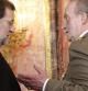 El rey Juan Carlos conversa con el presidente del Gobierno Mariano Rajoy (izda), antes de presidir la celebración de la PascuaMilitar que se celebra en el Palacio Real.