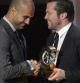 Josep Guardiola recibe el premio a mejor entrenador del año 2011 de manos del ex jugador Lothar Matthaeus