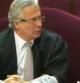 Imagen tomada de EFE TV del juez Baltasar Garzón y su abogado, Francisco Baena Bocanegra, durante el juicio en el Tribunal Supremo