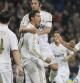 El delantero portugués del Real Madrid Cristiano Ronaldo (2i) celebra su primer gol, segundo de su equipo, junto a sus compañeros Xabi Alonso, Esteban Granero y Marcelo Vieira (izq-dcha) durante el partido, correspondiente a la primera jornada del Campeonato Nacional de Liga de Primera División aplazada por la huelga de futbolistas, que ha enfrentado esta noche al conjunto blanco con el Athletic de Bilbao en el estadio Santiago Bernabeu