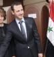 El presidente sirio Bashar al-Assad, y su esposa Asma, votando en el referéndum sobre la nueva Constitución