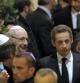 El presidente francés, Nicolás Sarkozy, y su esposa, Carla Bruni, durante el acto en la sinagoga de París en memoria de los asesinados en Toulouse