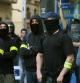 Miembros del cuerpo de seguridad de los Mossos d'Esquadra de paisano controlaron en todo momento la manifestación del Primero de Mayo