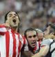 El jugador colombiano del Atlético de Madrid, Falcao (izq), celebra con sus compañeros el tercer gol al Athletic de Bilbao durante la final de la Liga Europa entre el Atlético de Madrid y el Athletic de Bilbao en el estadio Nacional de Bucarest, Rumanía, hoy, miércoles 9 de mayo de 2012. EFE/Robert Ghement