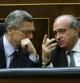 Los ministros de Justicia, Alberto Ruiz Gallardón, y de Interior, Jorge Fernández Díaz, durante el pleno del Congreso.