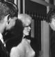 El fiscal General Robert Kennedy, John f. Kennedy y Marilyn Monroe en la Casa Blanca momentos después de la fiesta. La foto es obra de Cecil Stoughton, primer fotógrafo oficial de la Casa Blanca. El archivo de Stoughton (12.000 imágenes) se vendió en Bonhams en Nueva York el 09 de diciembre de 2010. Estimación del lote: $4.000 a $6.000. Se trata de la única imagen que existe de Marilyn Monroe junto a los Kennedy, el resto fueron confiscadas por el Servicio Secreto y el FBI.