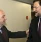 El presidente del PP, Mariano Rajoy, conversa con el comisario europeo de Asuntos Económicos y Monetarios, Joaquín Almunia, en Bruselas.