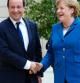 Hollande y Merkel en París