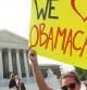 Partidarios de Obama celebran la histórica sentencia del Tribunal Supremo de Estados Unidos en Washington.