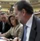 El presidente del Gobierno, Mariano Rajoy, acompañado de la vicepresidenta, Soraya Sáenz de Santamaría, y el ministro de Justicia, Alberto Ruiz-Gallardón.