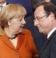 La canciller alemana Angela Merkel conversa con el presidente francés François Hollande durante la foto de familia de la cumbre de jefes de Estado y de Gobierno de la Unión Europea (UE) en Bruselas.