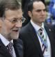 El presidente del gobierno español, Mariano Rajoy (i), llega a la cumbre de jefes de Estado y de Gobierno de la Unión Europea (UE) en Bruselas