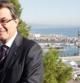 El candidat de CiU, Artur Mas, en el mirador del alcalde, con el Puerto de Barcelona al fondo.