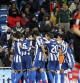 Casillas se lamenta mientras los jugadores del espanyol celebran su segundo tanto