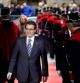 Artur Mas, a su llegada al acto de toma de posesión como presidente de la Generalitat, rodeado de Mossos d'Esquadra vestidos de gala