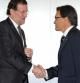 Archivo. El presidente del Ejecutivo, Mariano Rajoy, y el president de la Generalitat, Artur Mas, se saludan momentos antes del inicio del acto de inauguración de la línea de AVE Barcelona-Girona-Figueres