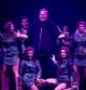 Kim Dotcom, rodeado de modelos en la presentación de Mega.