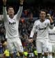 Mesut Ozil celebra un gol con Cristiano Ronaldo