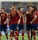 Los jugadores españoles celebran el gol de Cesc ante Uruguay