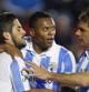 El centrocampista del Málaga Isco junto a sus compañeros, el delantero Julio César Baptista y Joaquín Sánchez, celebra el gol que ha marcado ante el Levante