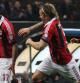 Boateng celebra su gol con Philippe Mexes y Riccardo Montolivo en los octavos de final de la Champions League