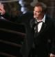 Tarantino recogiendo su segundo Oscar