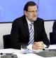 Mariano Rajoy, flanqueado por María Dolores de Cospedal y Javier Arenas