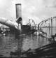 Vista del crucero Español Reina Cristina tras ser hundido en la batalla de la bahía de Manila, durante la guerra hispanoamericana, mayo de 1898. La Reina Cristina era el buque insignia en el Pacífico del escuadrón del Almirante Montojo