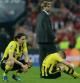 Los jugadores del Borussia Dortmund se lamentan de la derrota en la final de la Champions