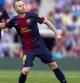 Andrés Iniesta celebra el gol cuarto gol del Barça ante el Málaga
